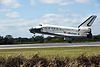 Concluding the STS-133 mission, Space Shuttle Discovery touches down at the Shuttle Landing Facility.jpg